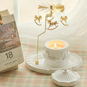 Enchanting carousel rotating soy candle in an intricate ceramic holder for elegant home decor - vivaessencepet