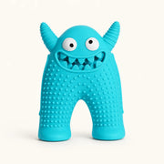 Turquoise monster-shaped dog chew toy with textured ridges