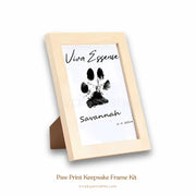 A mess-free paw print keepsake frame kit showing the elegant frame, inkless pad, and impression cards - vivaessencepet