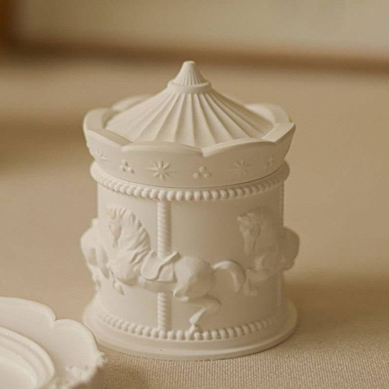 Vintage elegant decorative candle displaying whimsical kinetic art and ornate details - vivaessencepet