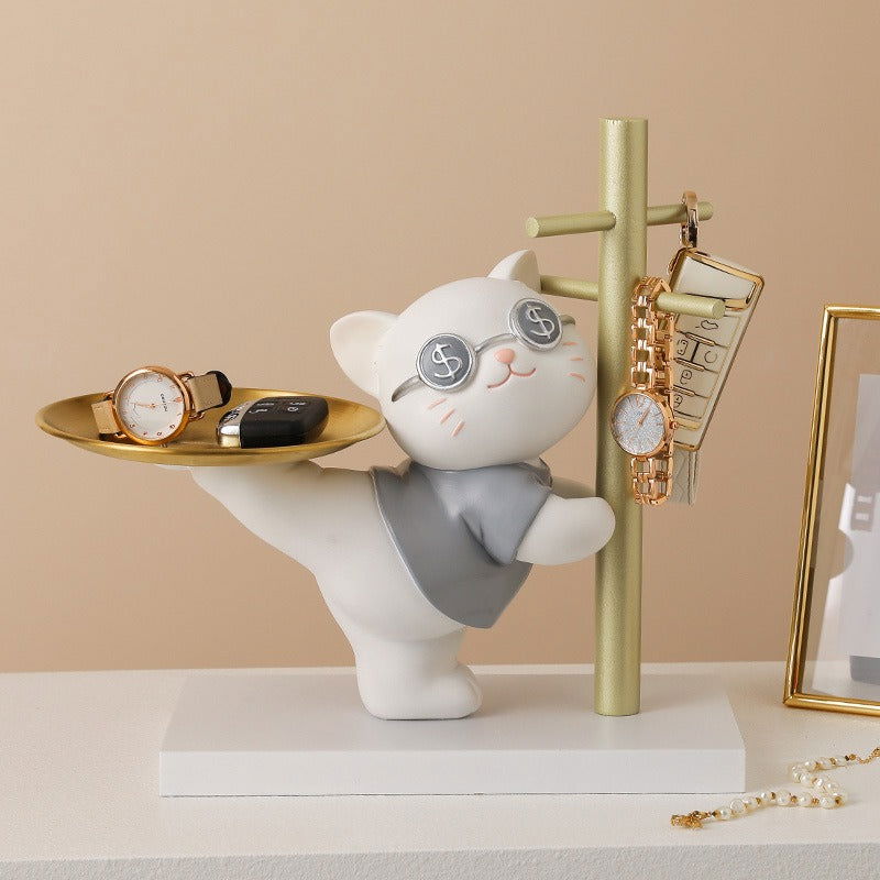Gilded animal trinket tray holding rings and coins. Minimalist gold accent home decor - vivaessencepet