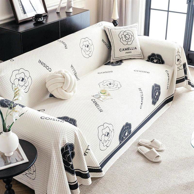 Aesthetic furniture protector draped over a couch, blending vintage style with modern comfort - vivaessencepet