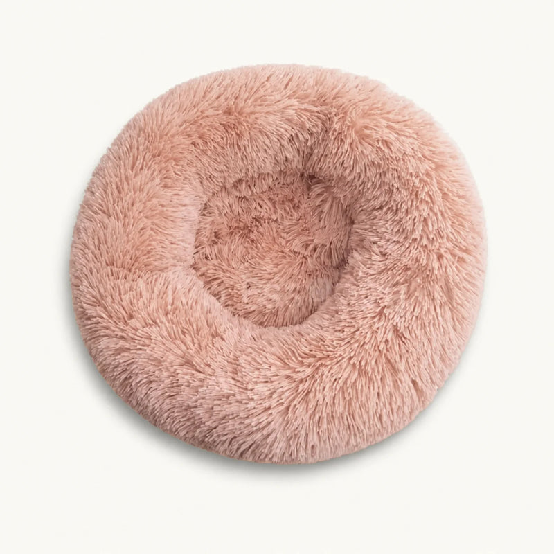 Calming donut pet bed with plush raised rim for curled-up comfort - vivaessencepet
