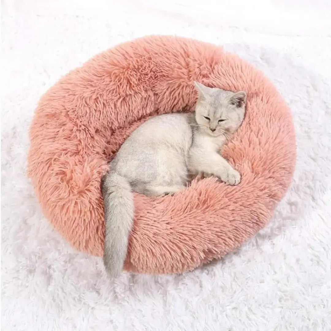 Plush washable donut bed that soothes anxiety through nesting comfort - vivaessencepet
