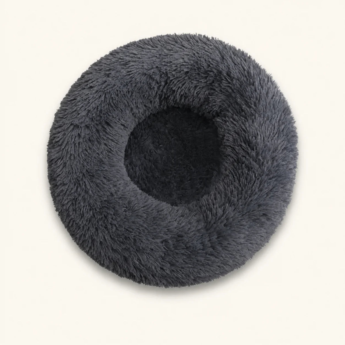 Tumble dried plush washable pet bed recovering its original fluffy donut shape after machine washing - vivaessencepet