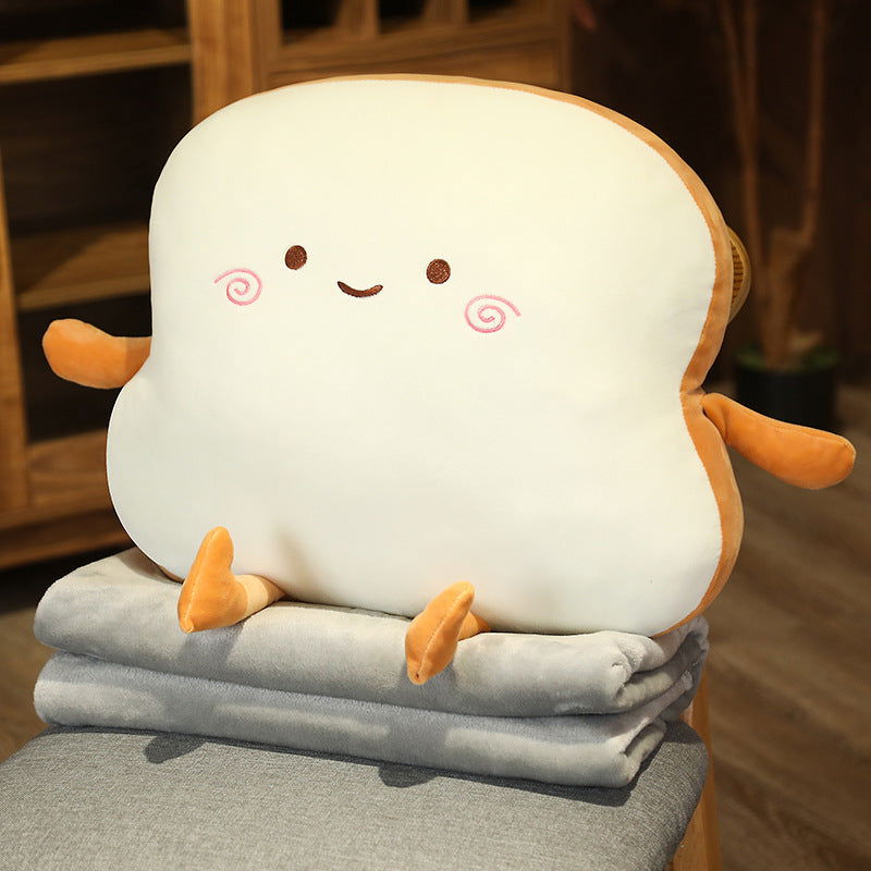 Compact toast pillow used as a desk-nap and travel comfort cushion with a playful plush look - vivaessencepet