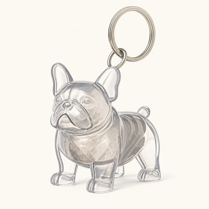 French Bucket pet fur keepsake keychain with clear capsule on a warm ivory background