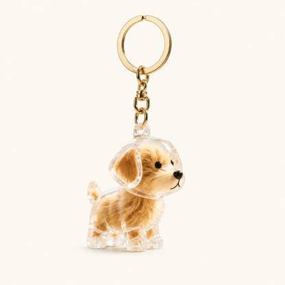 Golden Retriever pet fur keepsake keychain with clear capsule on a warm ivory background