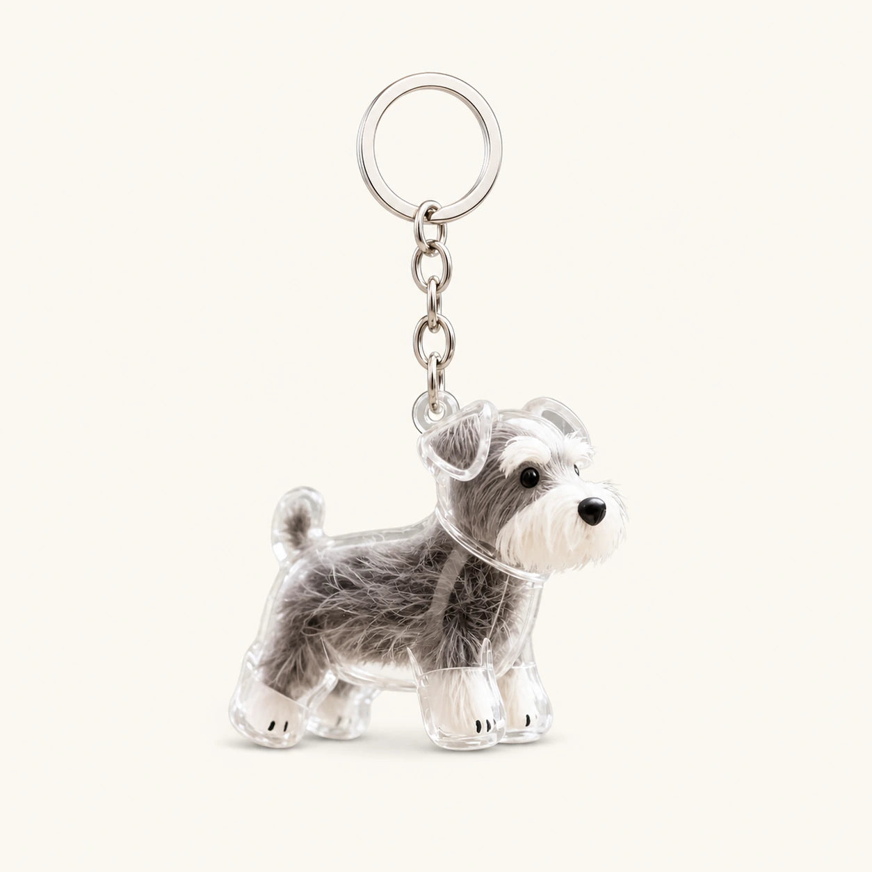 Schnauzer Standing pet fur keepsake keychain with clear capsule on a warm ivory background