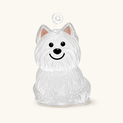 West Highland pet fur keepsake keychain with clear capsule on a warm ivory background