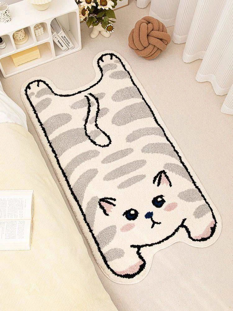Tapis ludique en forme de chat, à la silhouette facile à intégrer dans une décoration pensée pour les amoureux des animaux - vivaessencepet