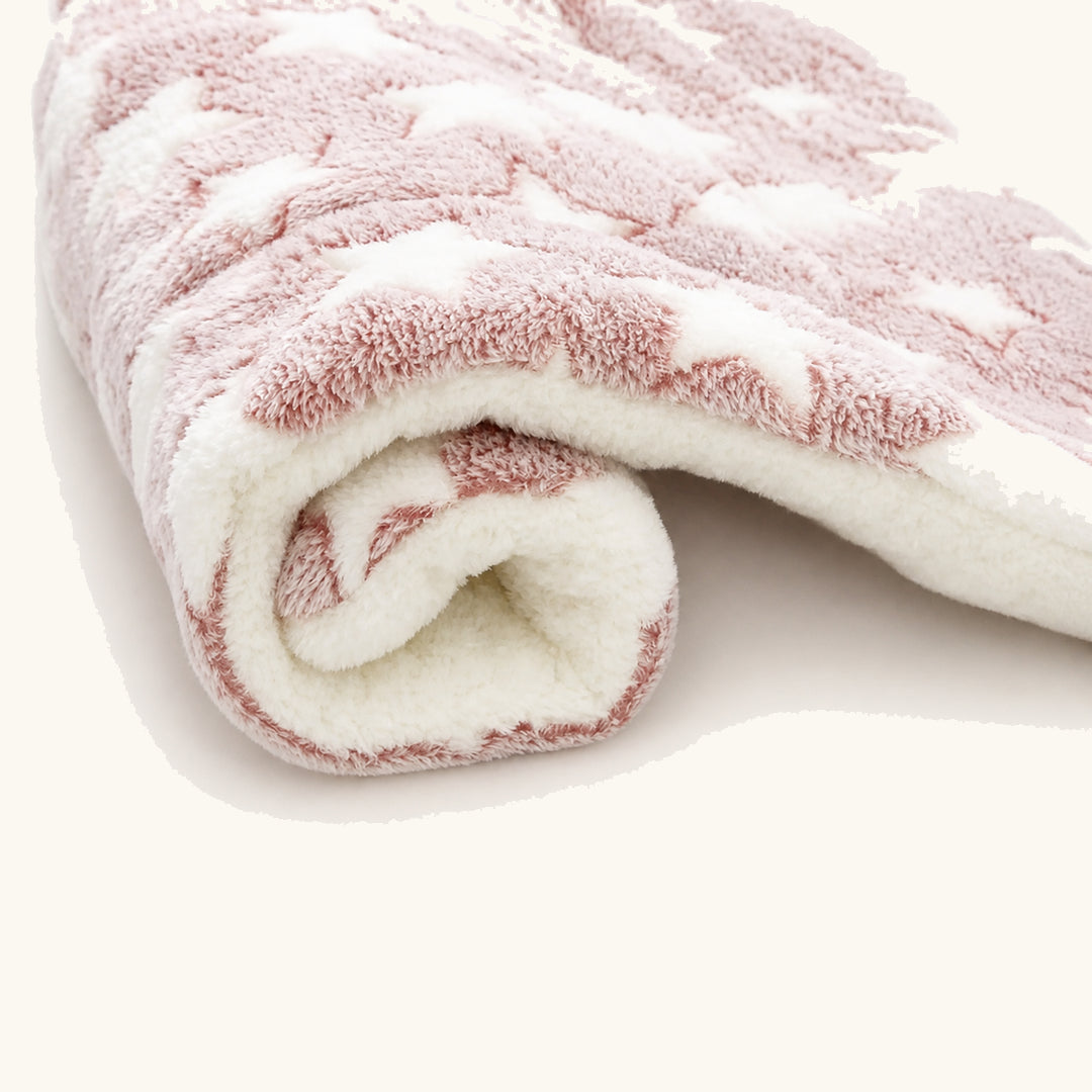 Red rolled flannel pet sleeping pad