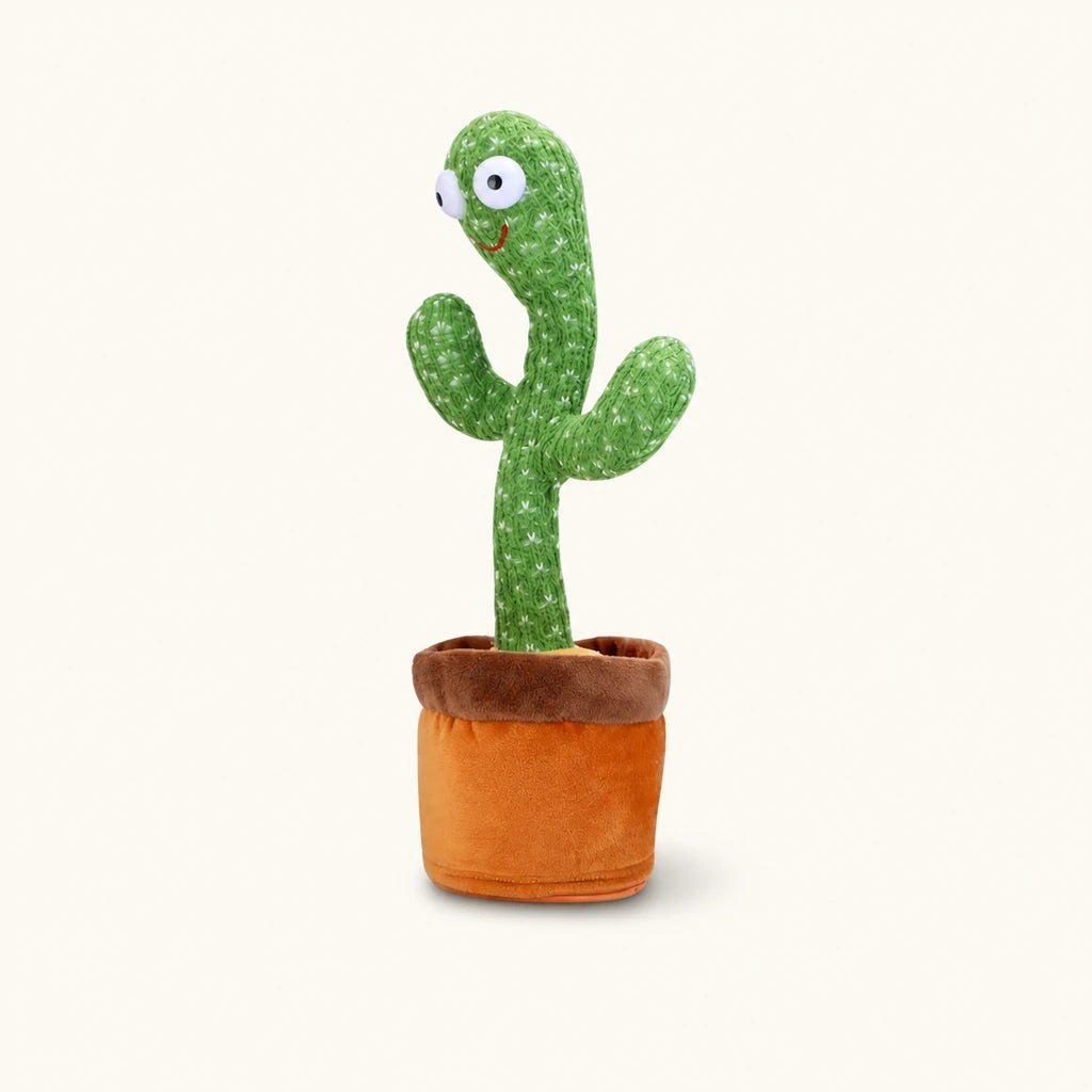Jouet cactus dansant en peluche verte, avec un pot orange-brun sur fond crème chaleureux